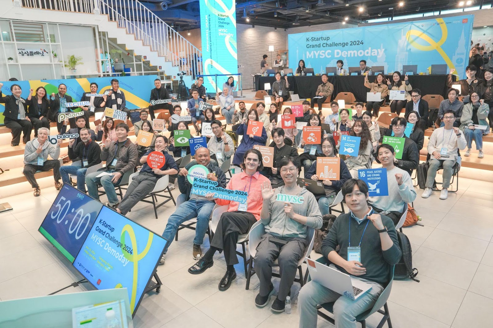 Group photo of all attendees, participants, and guests at the K-Startup Grand Challenge Demo Day 2024. (Image Credit: Jo Tae Hyun, MYSC Event Photographer)