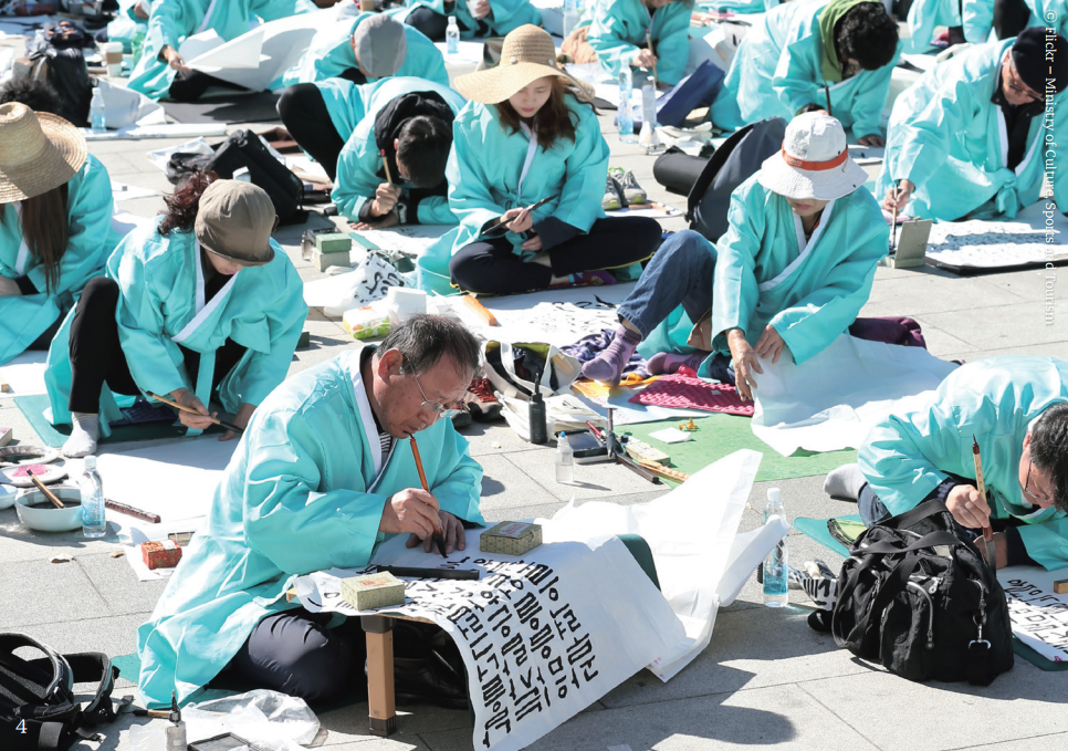 4. National Calligraphy Contest at Gwanghwamun Square Participants concentrate on their calligraphy at the 569th Hangeul Day celebration, held on October 9 at Gwanghwamun Square in Seoul.