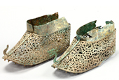 Ancient golden shoes on display