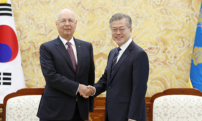 President Moon meets World Economic Forum leader