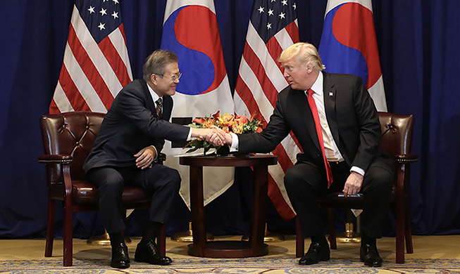 President Moon holds summit with US, Japan