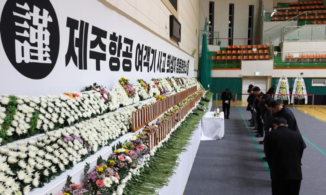 Scaled-down New Year's events to mourn plane crash victims