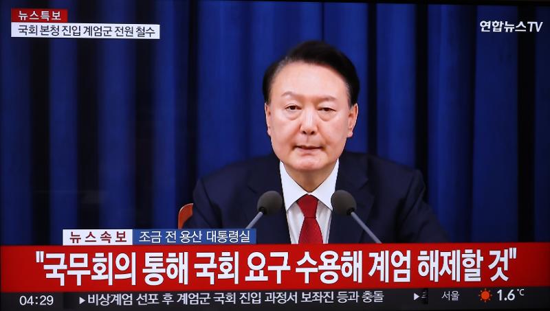 President Yoon Suk Yeol on the early morning of Dec. 4 announces the lifting of martial law in an emergency speech to the nation at the Office of the President in Seoul. (Yonhap News)  